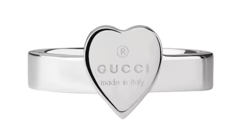 Trademark ring with heart pendant